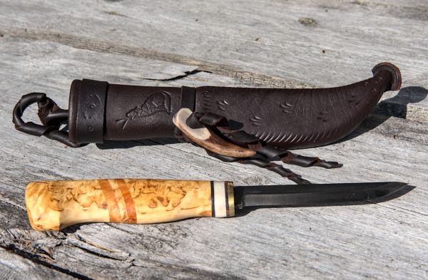 Knife with wooden handle and leather sheath