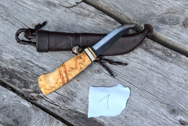 Knife with wooden handle and leather sheath