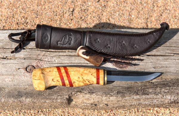 Knife with wooden handle and leather sheath