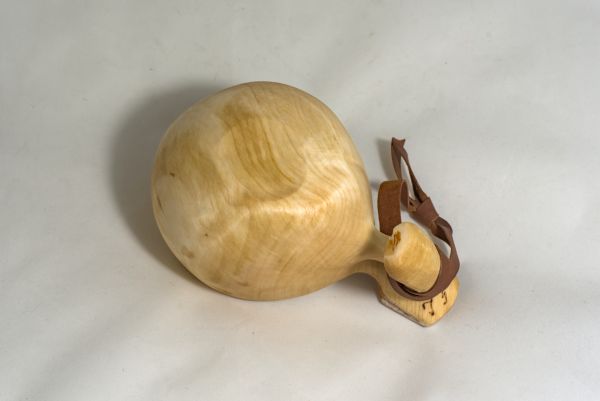 wooden cup with leather strap