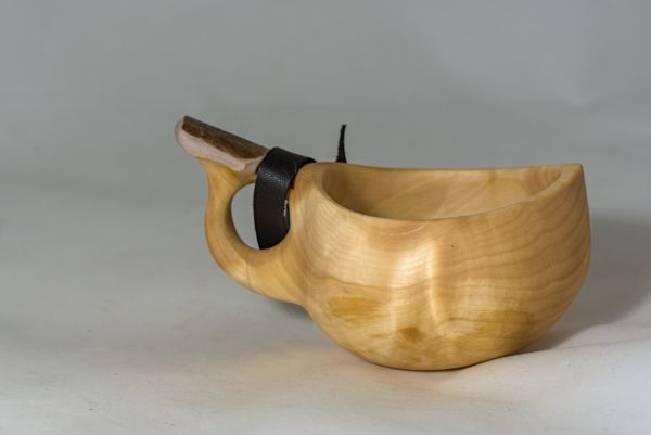 wooden cup with leather strap