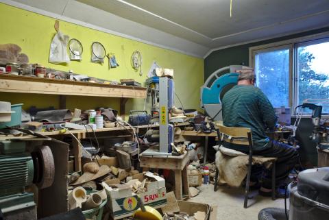 person working in wood workshop