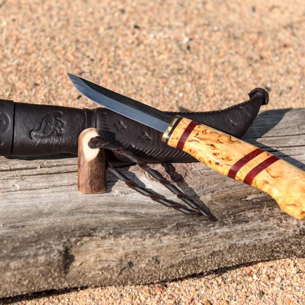 Knife with wooden handle and leather sheath