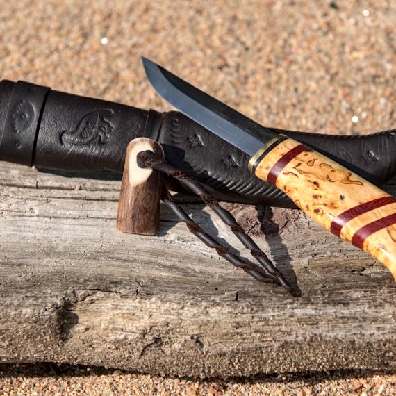 Knife with wooden handle and leather sheath